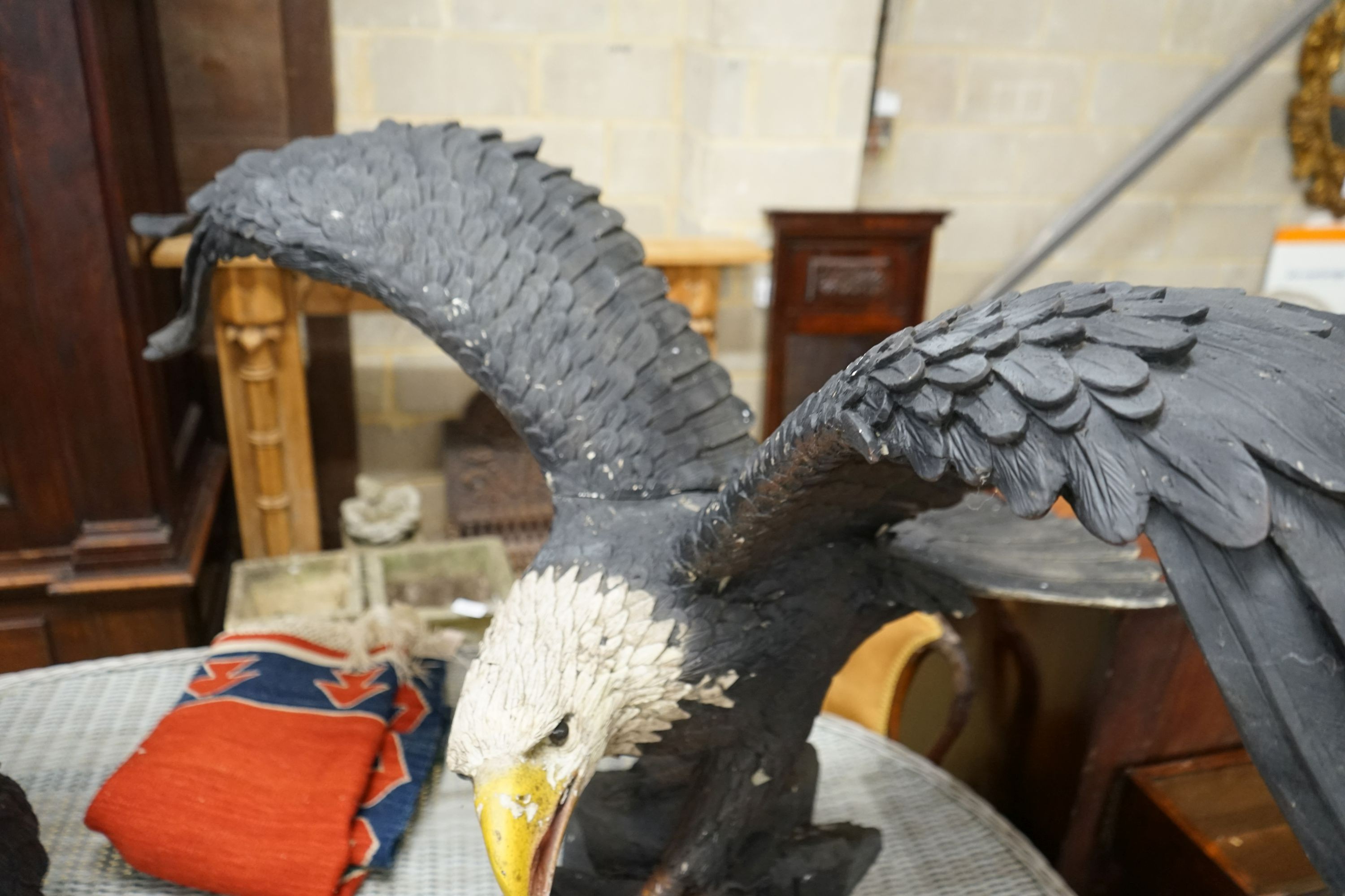 A large composition Golden Eagle garden ornament, height 90cm, width 165cm
